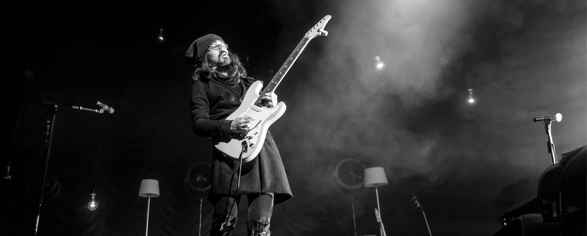 Mateus Asato performing on stage | MONO Australia